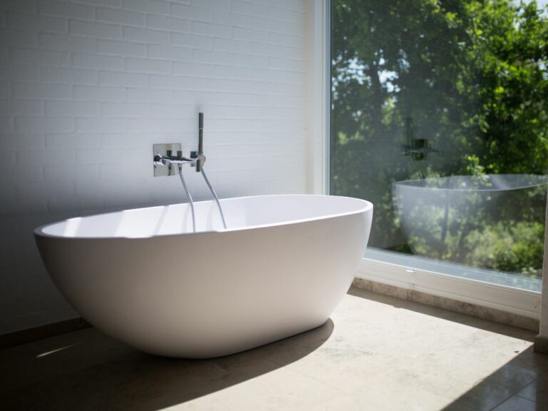 Some bathrooms setups are nice, like this luxurious bathtub. But with constant running water, mold buildup is always lurking.